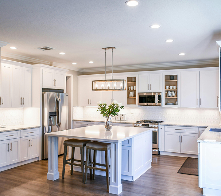 A well-lit small kitchen with under-cabinet lighting for a modern touch