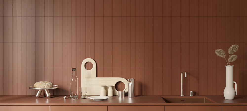 Kitchen with a warm terracotta backsplash, creating a cozy and inviting atmosphere