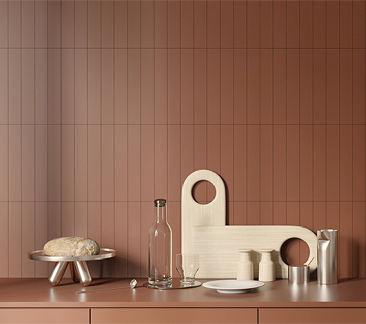 Kitchen with a warm terracotta backsplash, creating a cozy and inviting atmosphere