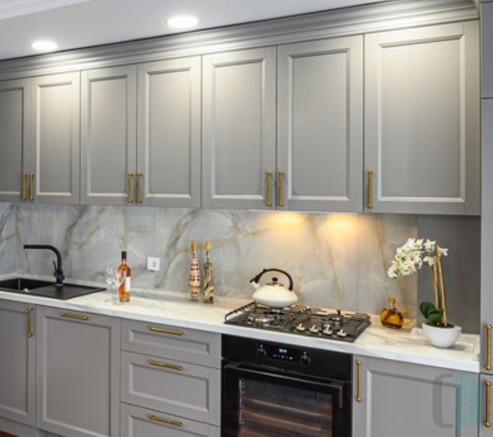 Glossy White Tile Backsplash with Gray Cabinets