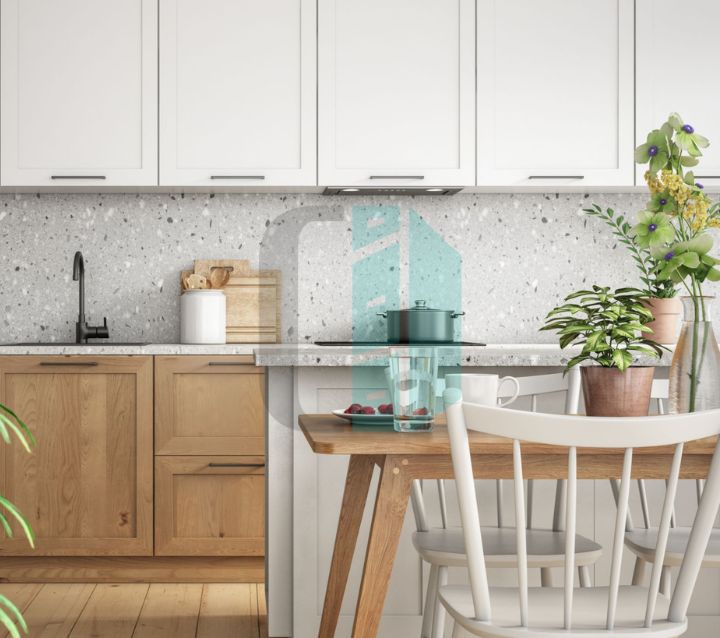 Kitchen featuring warm wood accents and cabinetry, creating a cozy and inviting atmosphere.